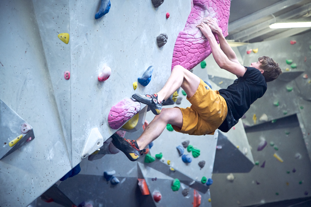 A child bouldering at The Climbing Hangar
