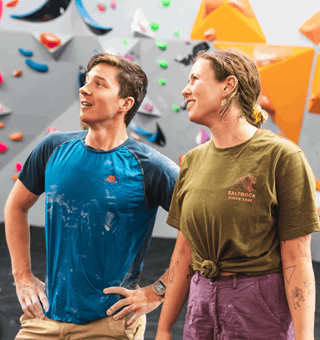 A man and woman bouldering at The Climbing Hangar Bristol