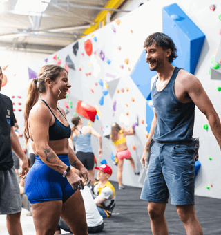 A group of friends bouldering at The Climbing Hangar