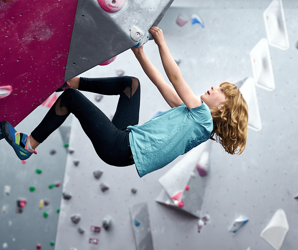 A child bouldering at The Climbing Hangar