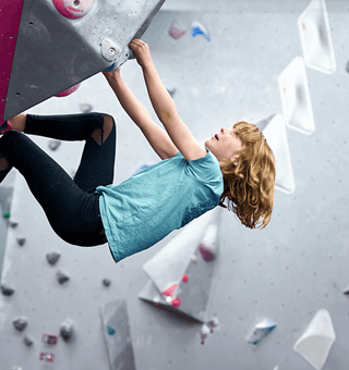 A child bouldering at The Climbing Hangar