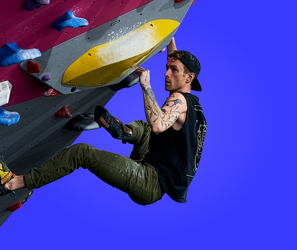 A man bouldering at The Climbing Hangar
