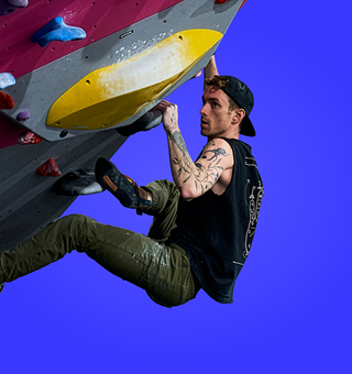A man bouldering at The Climbing Hangar