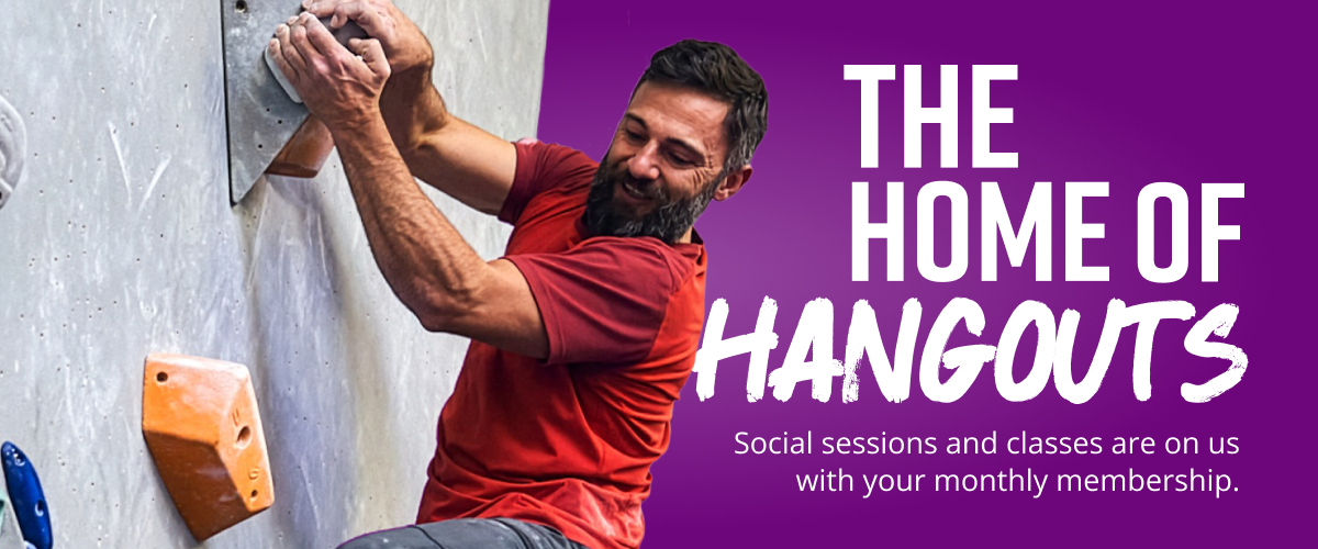A man bouldering at The Climbing Hangar