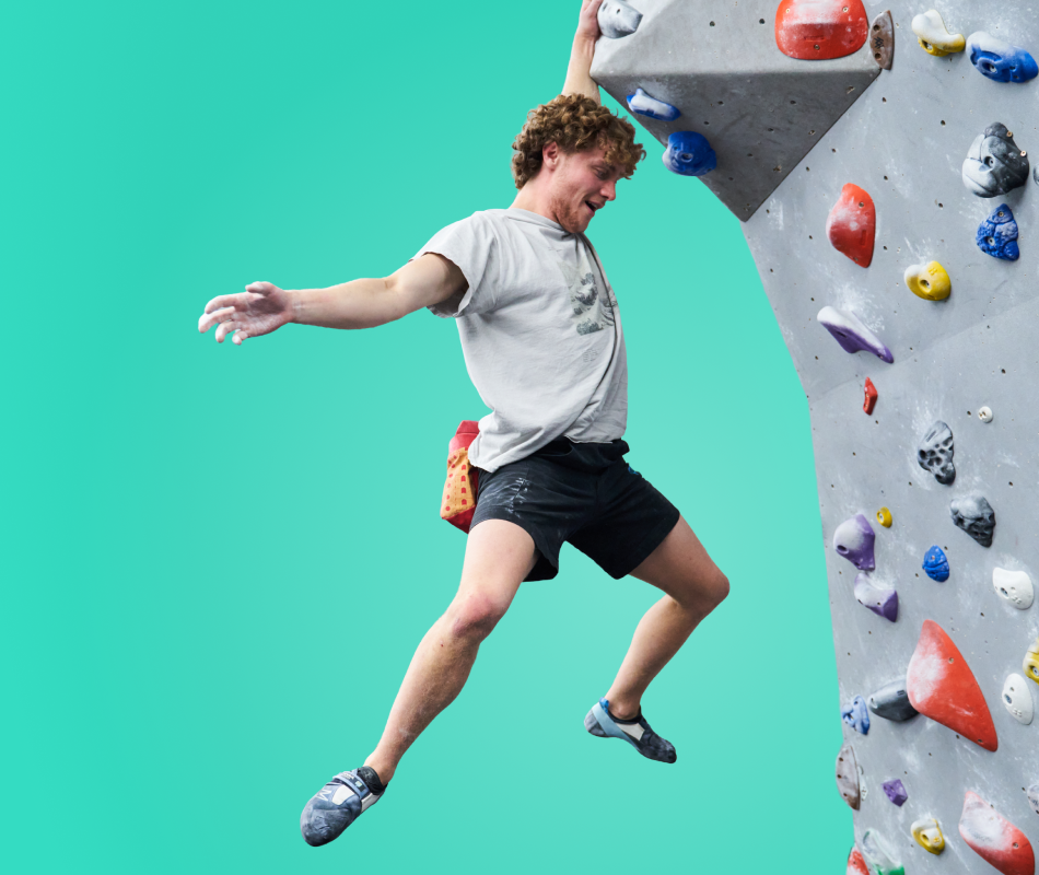 A man bouldering at The Climbing Hangar
