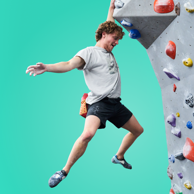 A man bouldering at The Climbing Hangar