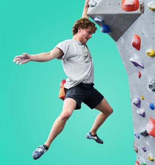 A man bouldering at The Climbing Hangar